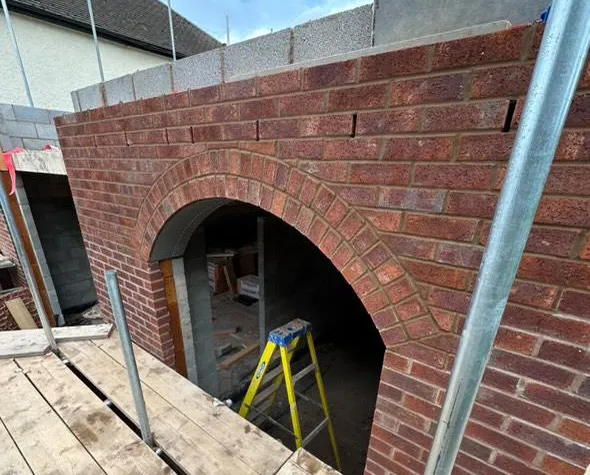 Brick arch and blockwork during construction